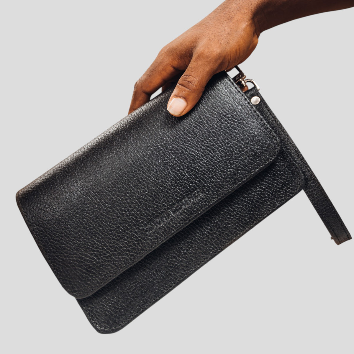 The zachi clutch bag