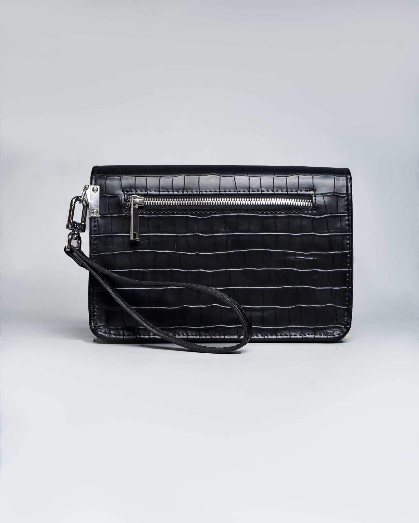 The zachi clutch bag