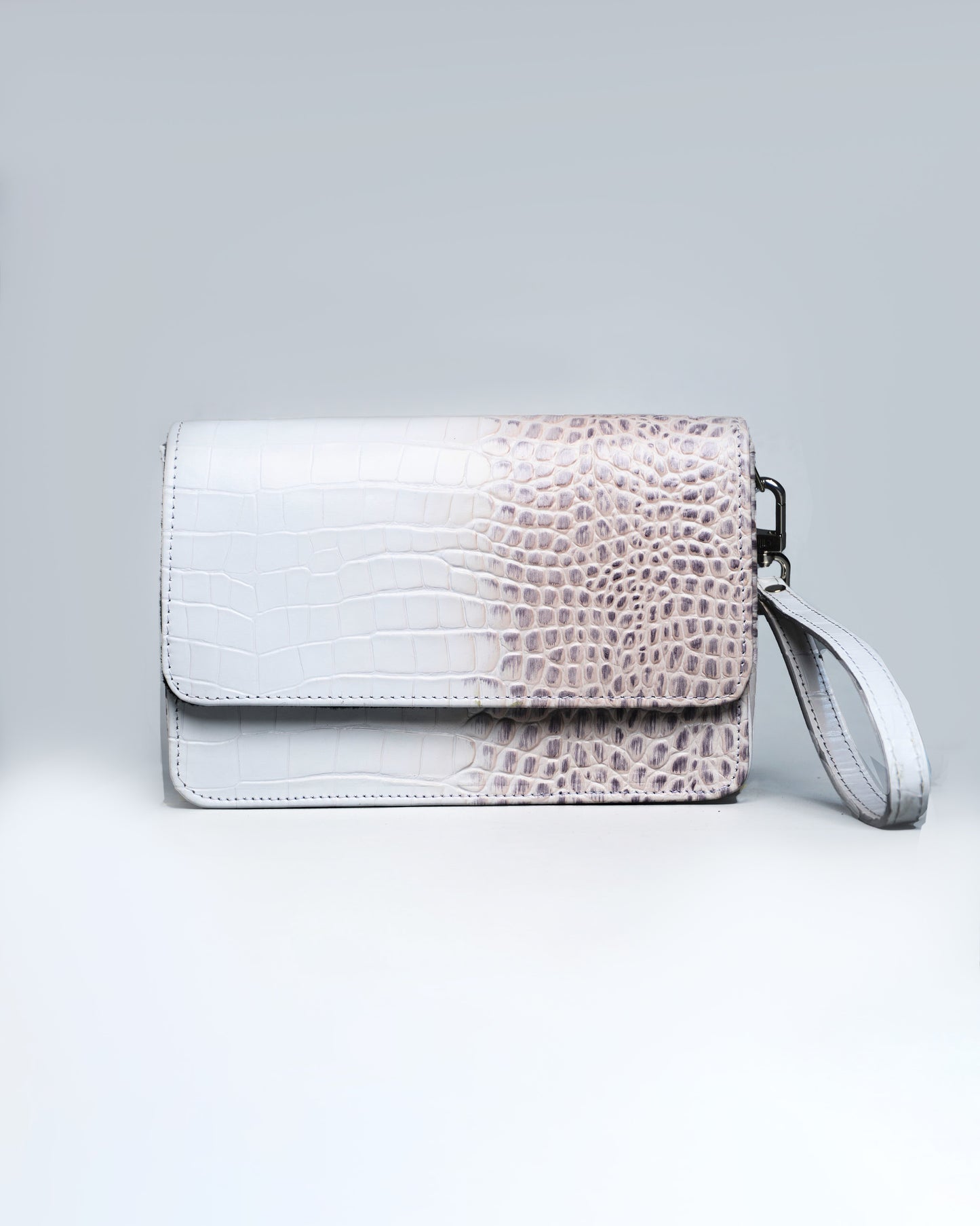 The zachi clutch bag